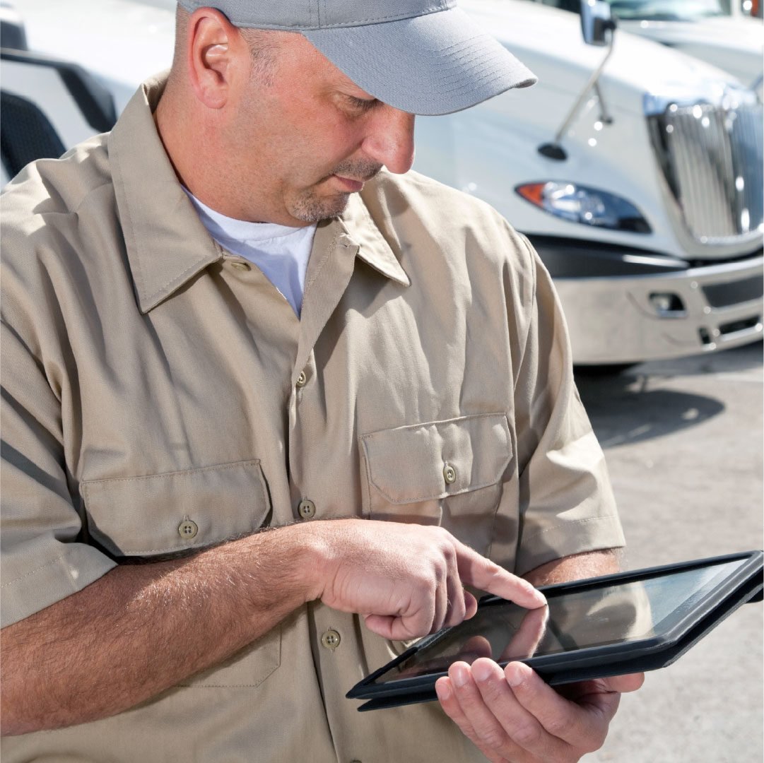 male-truck-driver-white-trucks-standing-2_adj_1080x1080