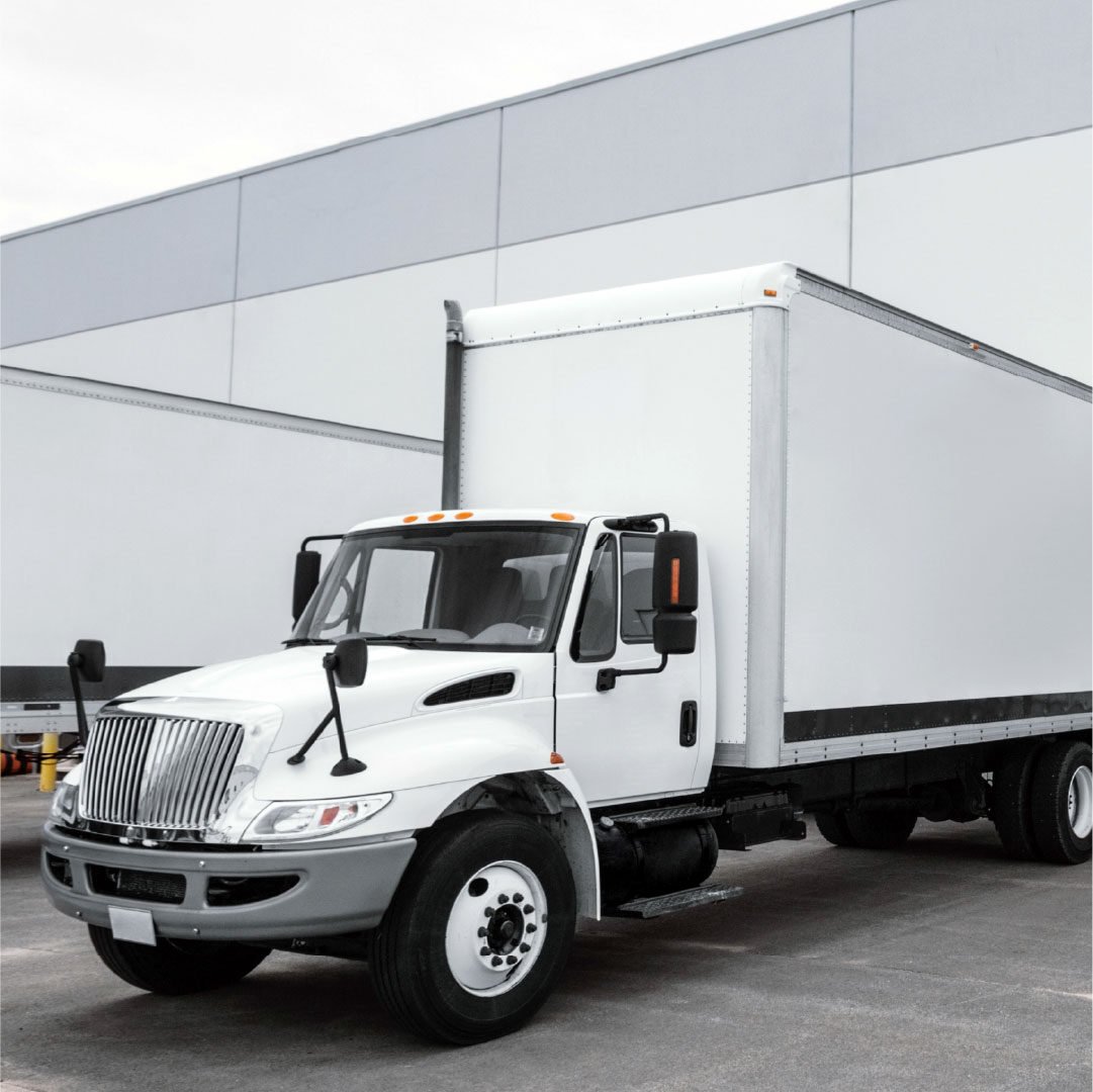 white-delivery-trucks-loading-dock_adj_1080x1080