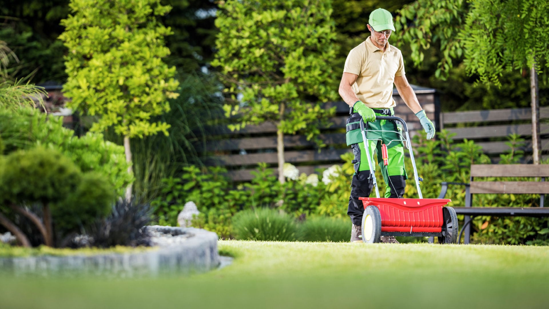 landscaper-spreading-seeds_adj_1920x1080
