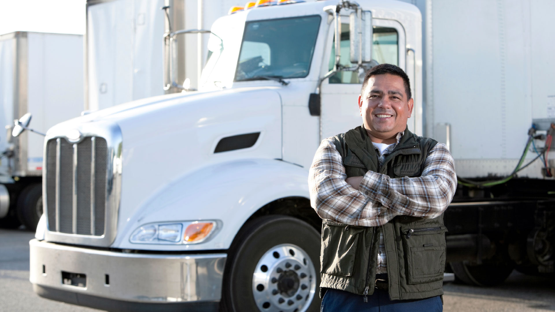 male-truck-driver-white-truck-1_adj_1920x1080