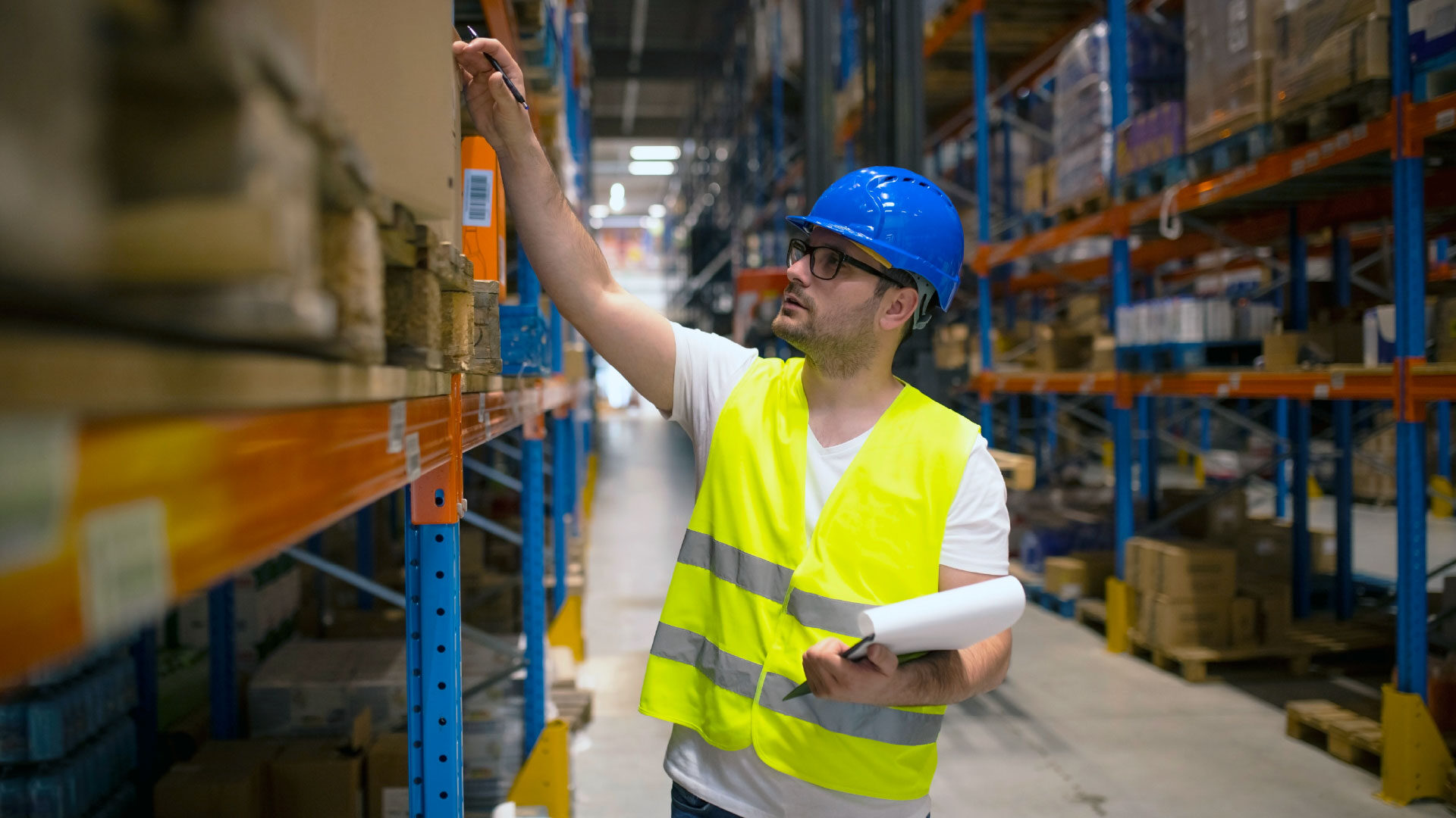 male-warehouse-worker-checking-inventory-2_adj_1920x1080