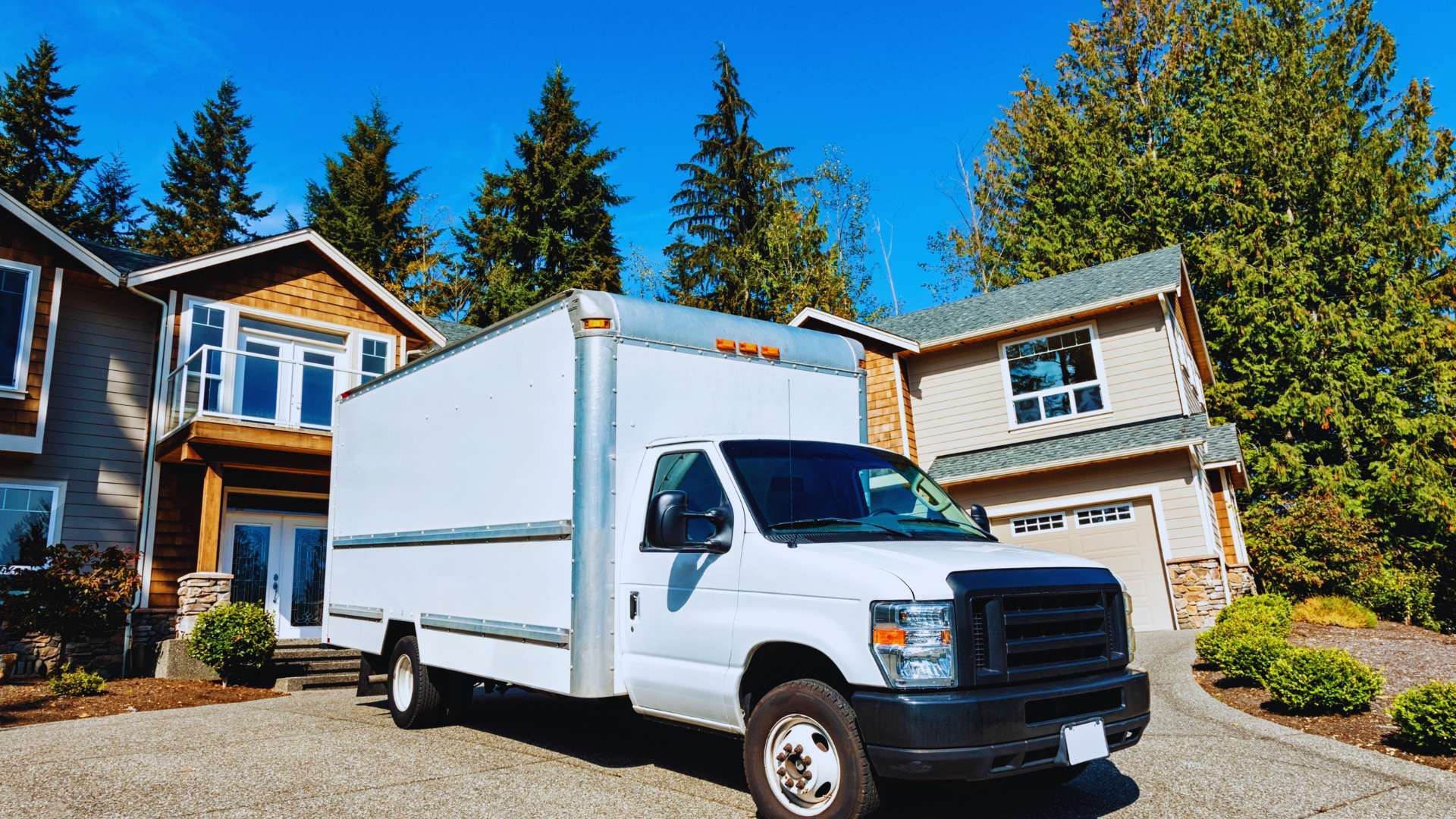 white-moving-truck-driveway_1920x1080